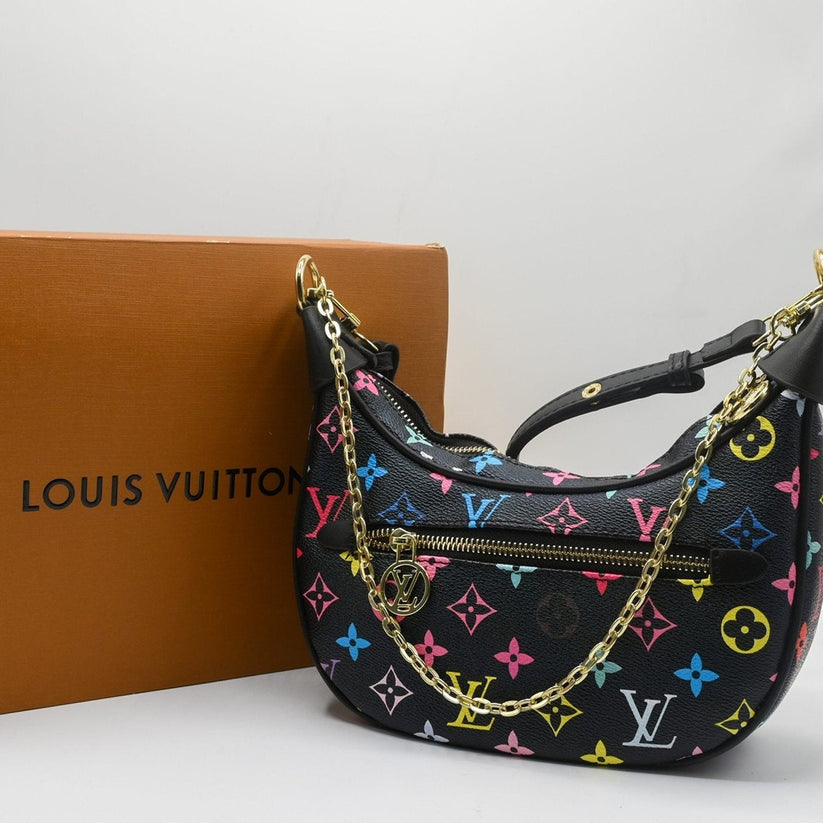 LIS VUITTON MONOGRAM BLACK CROSS BODY BAG.