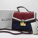 ALDO EMALINE MONOGRAM TOP MAROON NAVY HANDLE BAG.