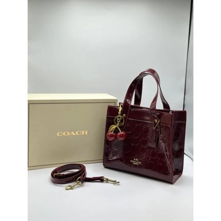 COACH SIGNATURE MAROON PATENT MINI TOTE BAG WITH CHERRY CHARM