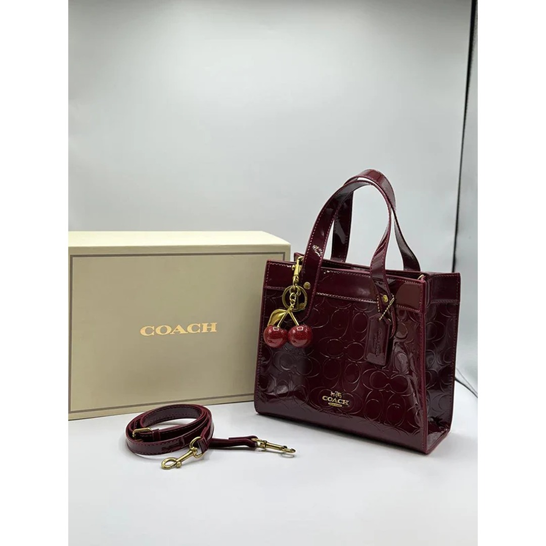 COACH SIGNATURE MAROON PATENT MINI TOTE BAG WITH CHERRY CHARM