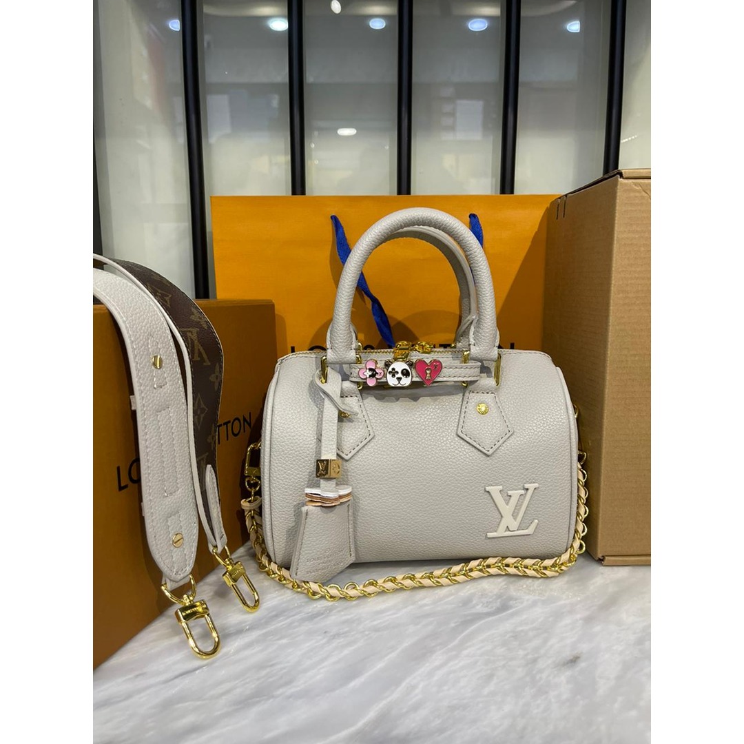 LOUIS VUITTON CREAM SPEEDY BANDOULIERE 20 HANDBAG.