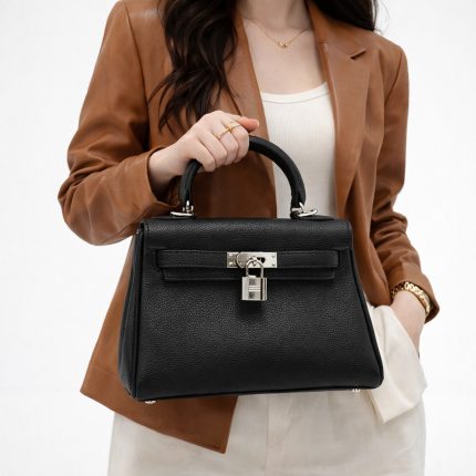 HERMES KELLY TOGO 25 RETURNS BEIGE HANDBAG.