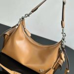 Coach Pocket Juliet Beige Bag.