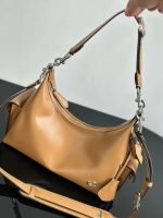 Coach Pocket Juliet Beige Bag.